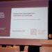 Kernavės konferencijoje Vaidutė Ščiglienė skaito pranešimą apie UNESCO pasaulio paveldo apsaugą