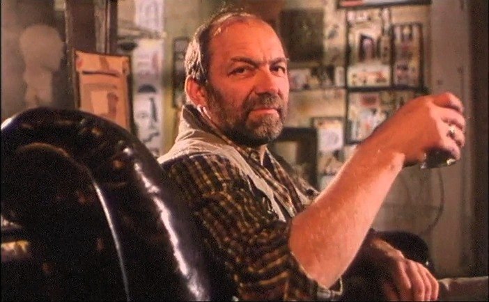 Aktorius Vidas Petkevičius filmo „Vilko dantų karoliai“ scenoje.